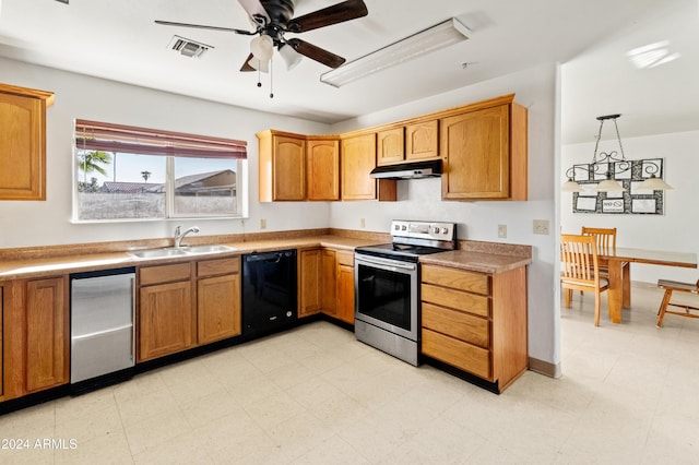 kitchen featuring ceiling fan, sink, stainless steel appliances, and hanging light fixtures