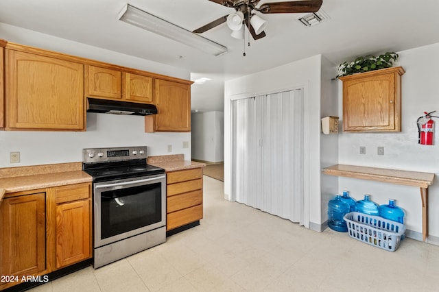 kitchen with ceiling fan and stainless steel electric range oven