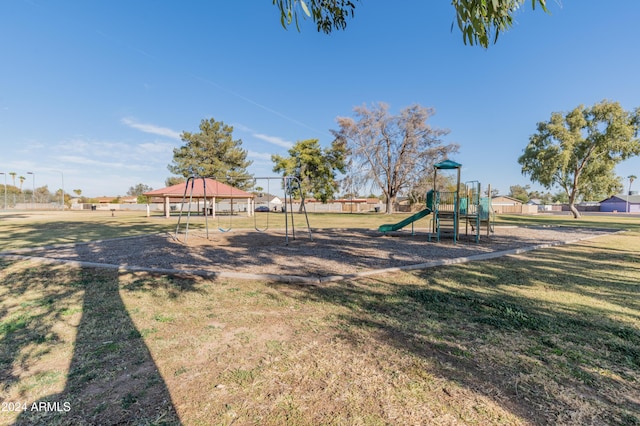 view of playground with a gazebo and a yard