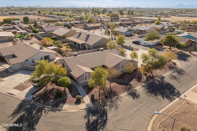 birds eye view of property featuring a mountain view