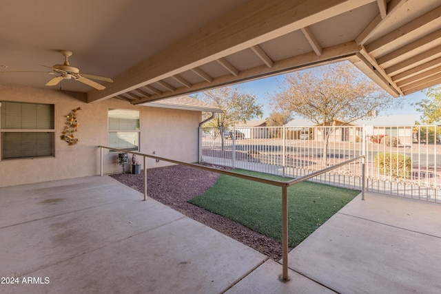 exterior space featuring ceiling fan and a patio area