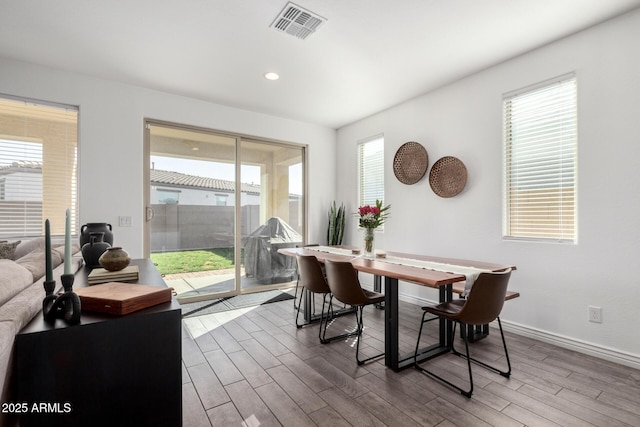 dining room featuring hardwood / wood-style flooring