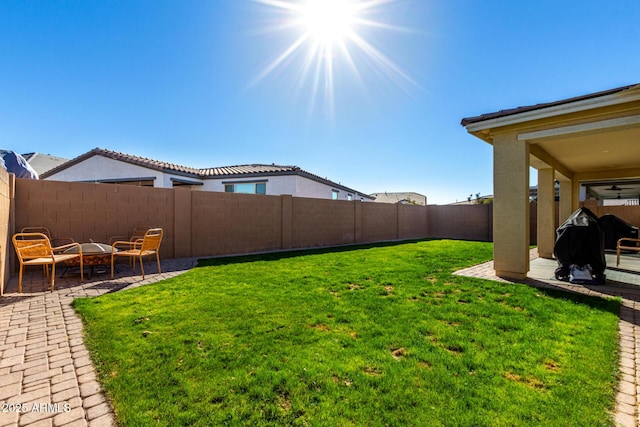 view of yard with a patio area