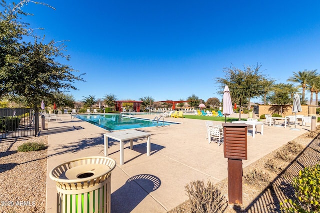 view of swimming pool featuring a patio