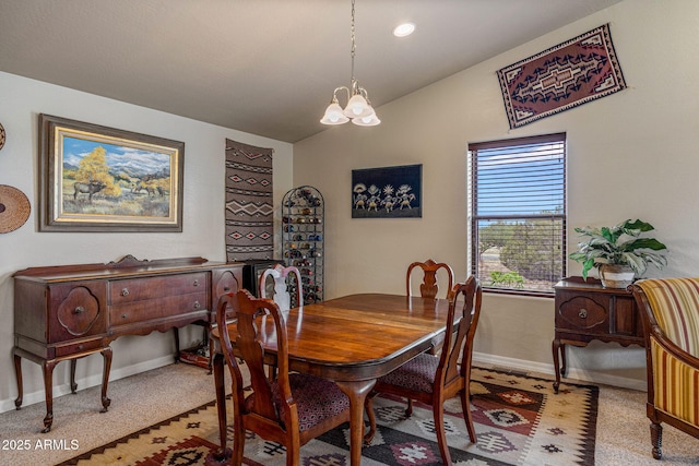 8870 Happy Trl, Show Low, AZ 85901 - dining room featuring a chandelier, lofted ceiling, and light colored carpet