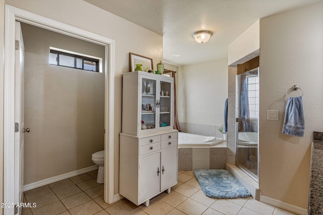 8870 Happy Trl, Show Low, AZ 85901 - bathroom with a garden tub, tile patterned floors, and a shower stall