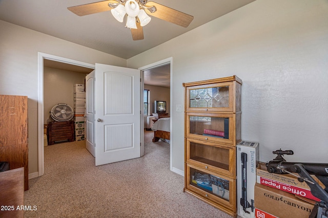 8870 Happy Trl, Show Low, AZ 85901 - bedroom with light colored carpet and a ceiling fan
