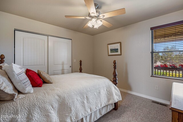 8870 Happy Trl, Show Low, AZ 85901 - bedroom featuring a closet, carpet floors, and ceiling fan