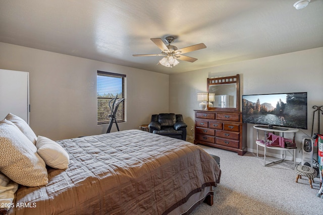 8870 Happy Trl, Show Low, AZ 85901 - carpeted bedroom with a ceiling fan and baseboards