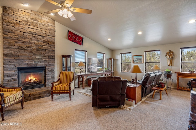 8870 Happy Trl, Show Low, AZ 85901 - living area with vaulted ceiling, carpet floors, a fireplace, ceiling fan, and recessed lighting