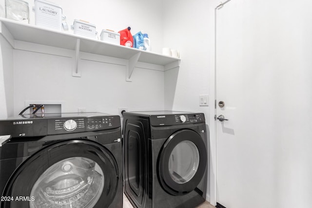 laundry area featuring independent washer and dryer