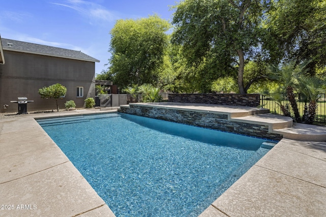14749 E Pecos Rd, Gilbert, AZ 85295 - view of swimming pool with area for grilling, fence, and a fenced in pool