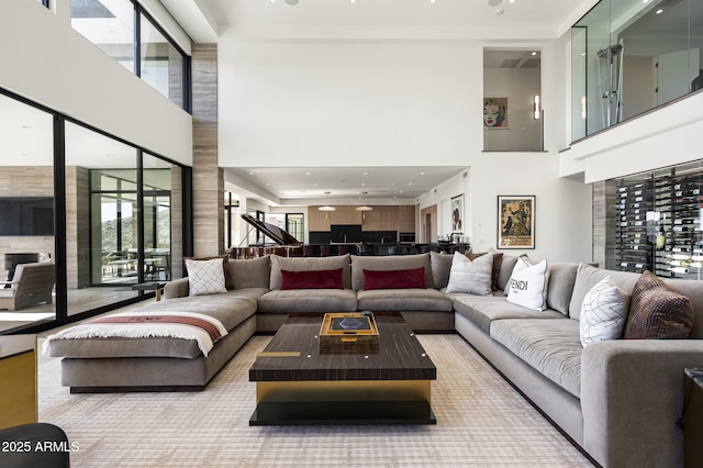 living room with a towering ceiling