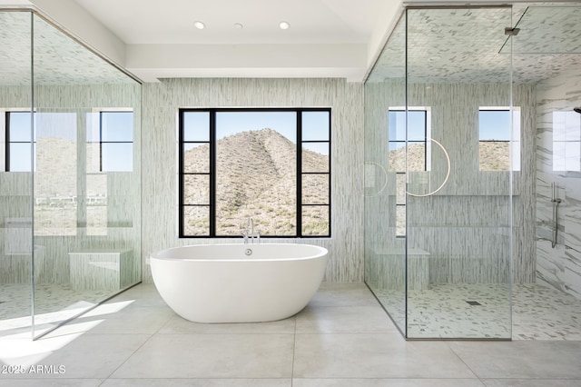 bathroom with tile patterned flooring and plus walk in shower