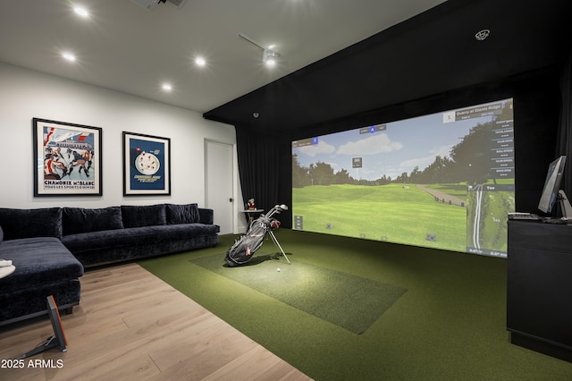 playroom featuring golf simulator and light wood-type flooring