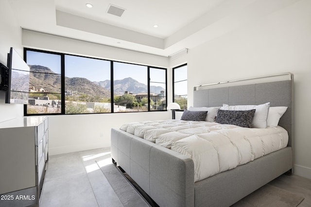 bedroom featuring a mountain view