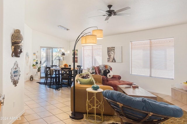 tiled living room with vaulted ceiling and ceiling fan