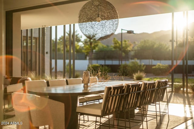 dining room featuring a mountain view