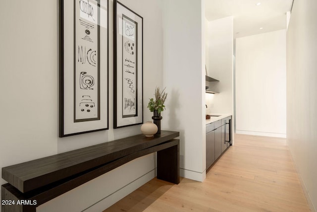 corridor featuring light hardwood / wood-style floors