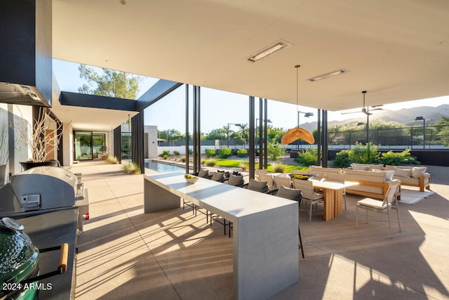 view of patio / terrace featuring a mountain view