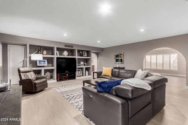 living room featuring light wood-type flooring