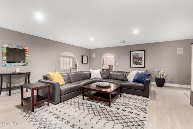 living room with light hardwood / wood-style flooring