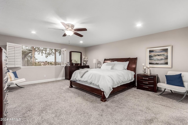 bedroom featuring ceiling fan and carpet floors