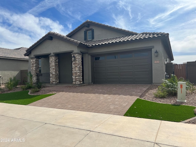 view of front of property featuring a garage