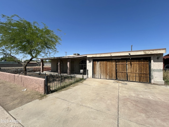 1816 N 38th Dr, Phoenix, AZ 85009 - view of front of property with driveway and a garage