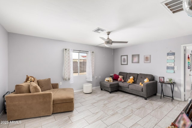 5044 N 18th Ave, Phoenix, AZ 85015 - living room with ceiling fan and baseboards