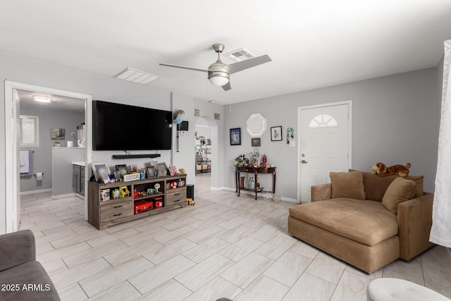 5044 N 18th Ave, Phoenix, AZ 85015 - living area featuring a ceiling fan and arched walkways