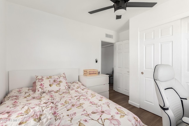 5044 N 18th Ave, Phoenix, AZ 85015 - bedroom with dark wood-style floors and ceiling fan