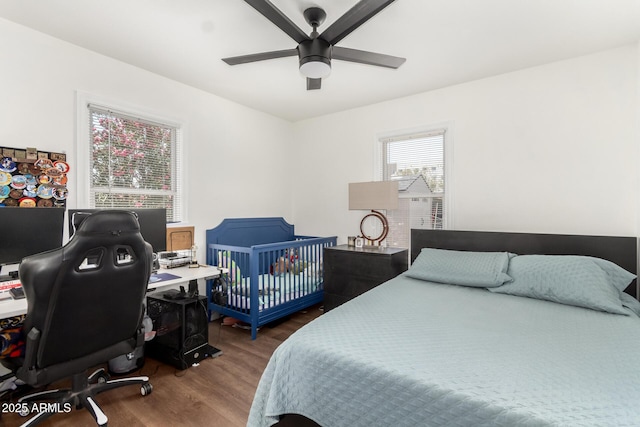 5044 N 18th Ave, Phoenix, AZ 85015 - bedroom featuring wood finished floors, a desk, and a ceiling fan