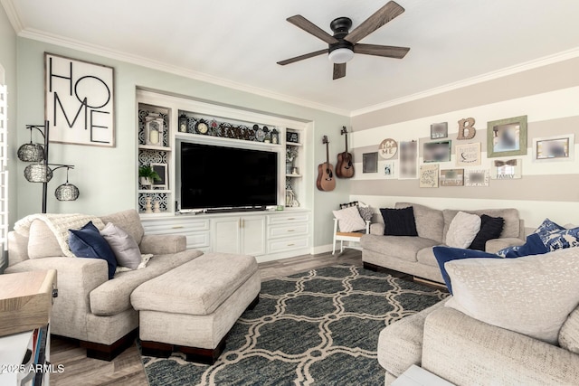 597 S 221st Dr, Buckeye, AZ 85326 - living room with ceiling fan, wood finished floors, crown molding, and baseboards