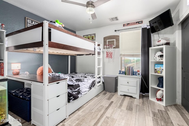 597 S 221st Dr, Buckeye, AZ 85326 - bedroom with light wood-style floors and a ceiling fan