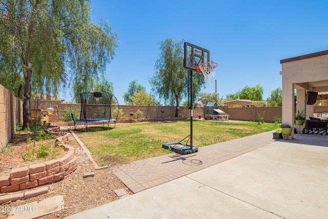 597 S 221st Dr, Buckeye, AZ 85326 - view of patio / terrace with a trampoline