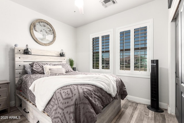 597 S 221st Dr, Buckeye, AZ 85326 - bedroom with wood finished floors and baseboards