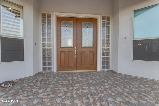 entrance to property featuring french doors