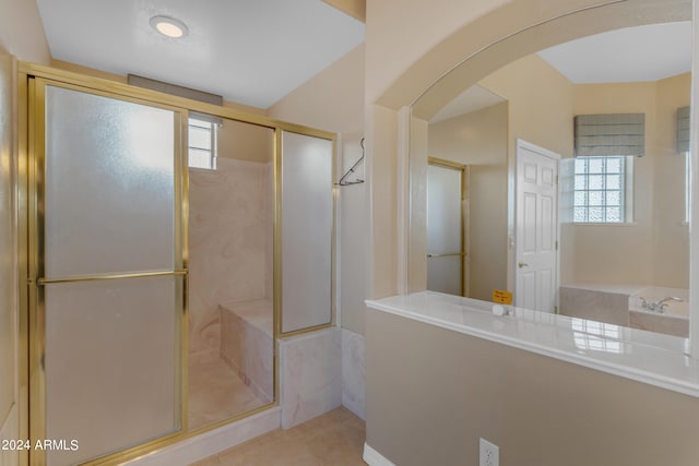 bathroom featuring tile patterned floors and an enclosed shower