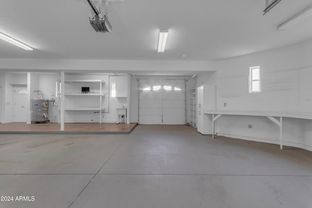 garage with sink and a garage door opener