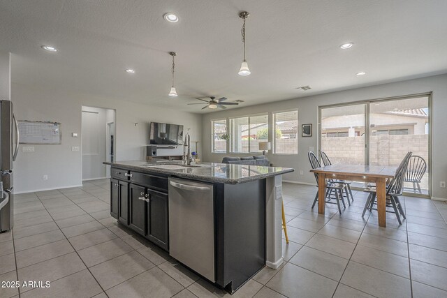 22463 E Desert Spoon Dr, Queen Creek, AZ 85142 - kitchen with appliances with stainless steel finishes, a sink, a ceiling fan, baseboards, and recessed lighting