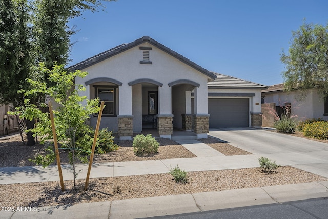 22463 E Desert Spoon Dr, Queen Creek, AZ 85142 - view of front facade featuring covered porch, an attached garage, stucco siding, driveway, and stone siding