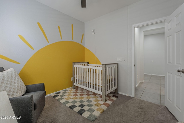 22463 E Desert Spoon Dr, Queen Creek, AZ 85142 - carpeted bedroom with ceiling fan, tile patterned floors, baseboards, a nursery area, and lofted ceiling
