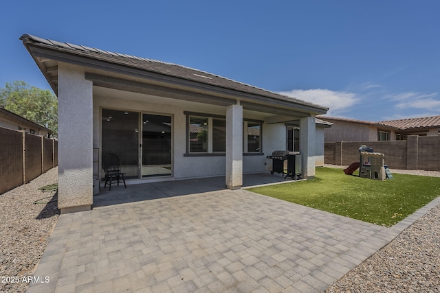 22463 E Desert Spoon Dr, Queen Creek, AZ 85142 - back of house featuring a patio and stucco siding