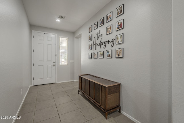 22463 E Desert Spoon Dr, Queen Creek, AZ 85142 - entryway with light tile patterned floors and baseboards