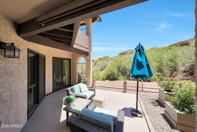 16108 E Emerald Dr Unit 106, Fountain Hills, AZ 85268 - view of patio featuring an outdoor living space and a vegetable garden