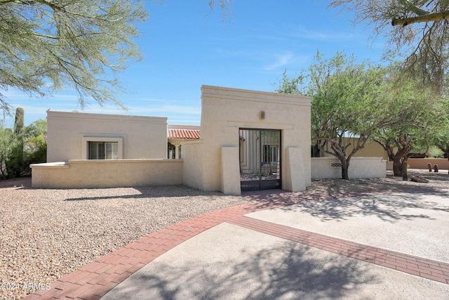 adobe home with a patio