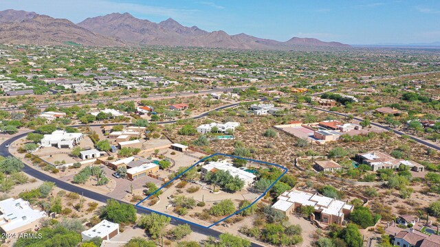 drone / aerial view featuring a mountain view