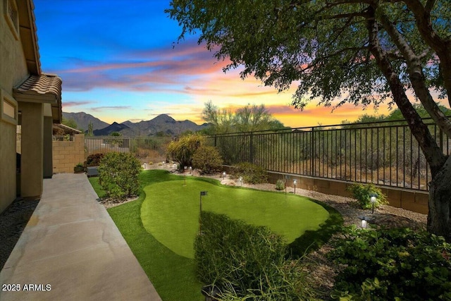 yard at dusk with a mountain view