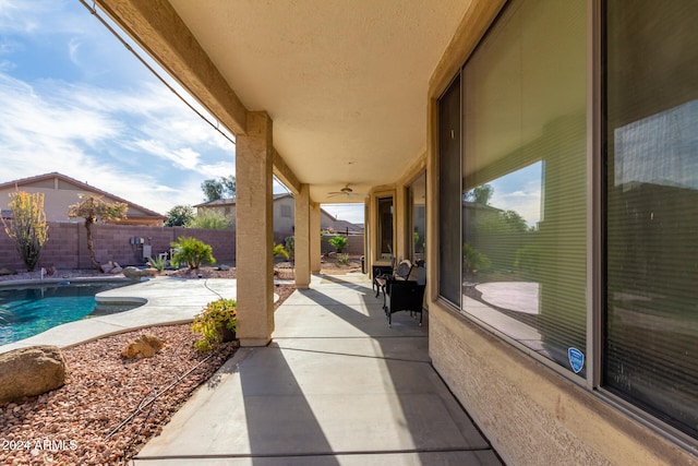 view of patio / terrace featuring a fenced in pool